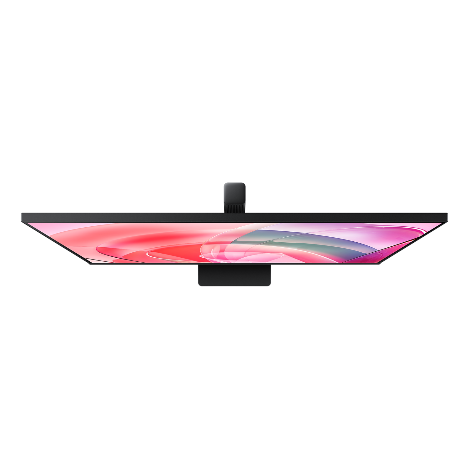 Overhead view of a computer monitor. The screen displays a colorful abstract design on a black background.