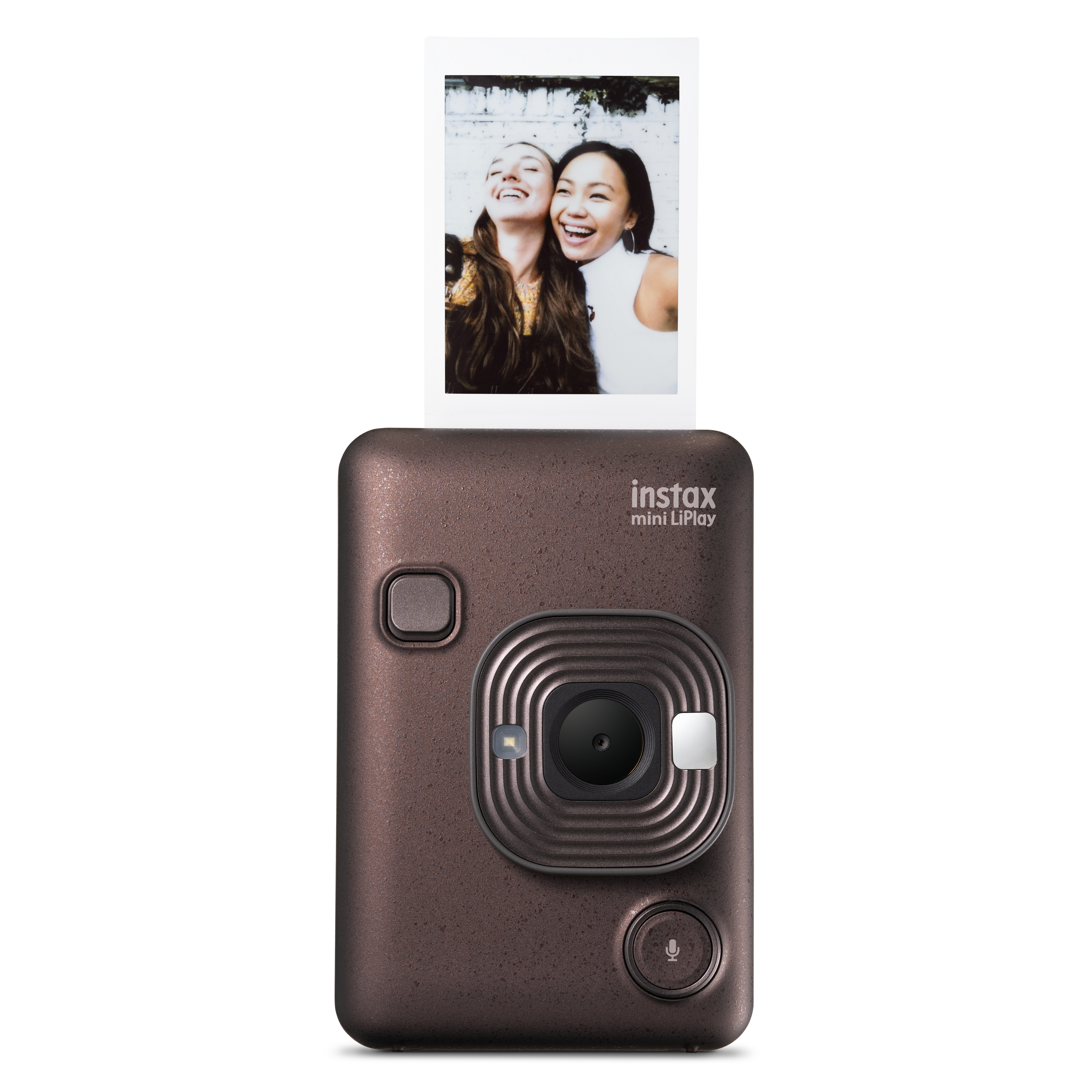 Eine braune Instax-Kamera mit einem Foto von zwei lächelnden Frauen oben.