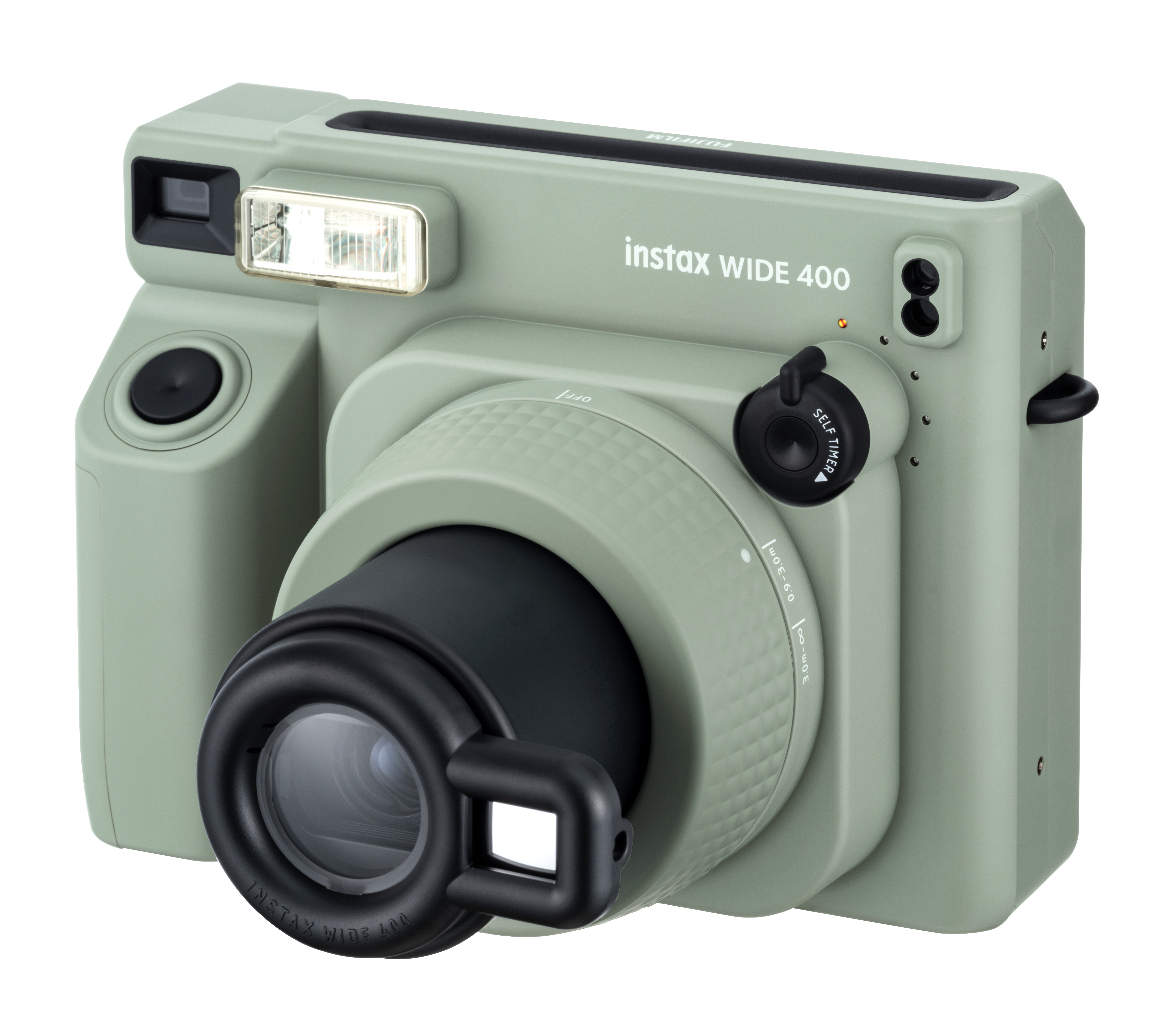Grüne Instax Wide 400 Kamera mit Blitz und schwarzem Objektiv, weißer Hintergrund.