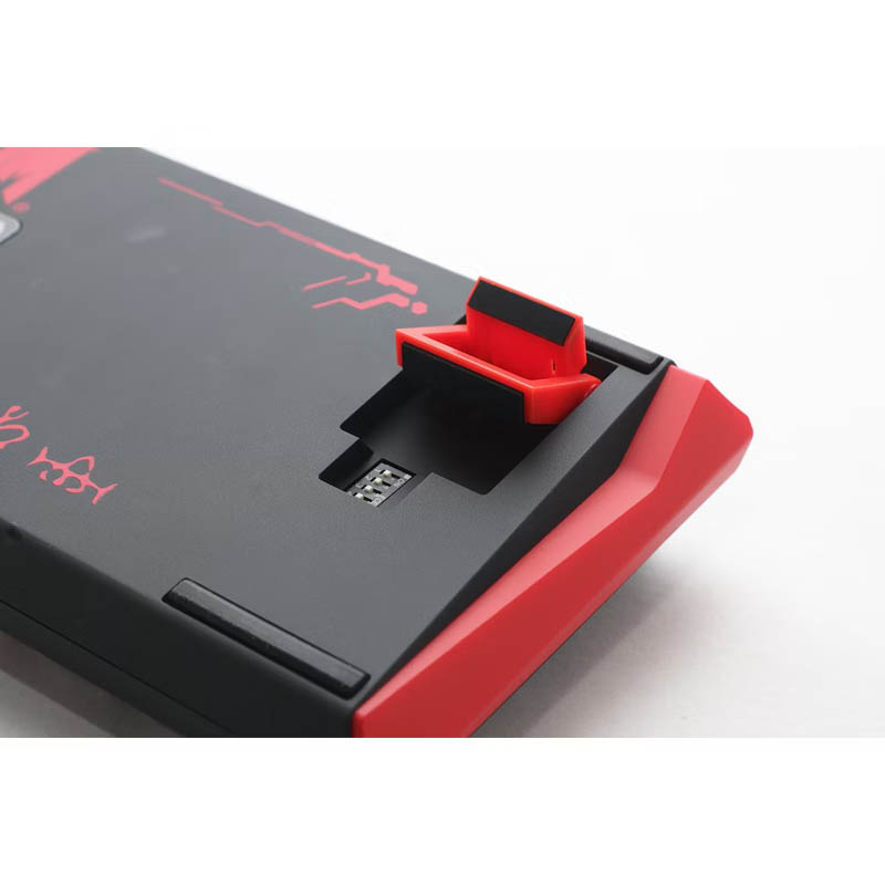 Mando Nintendo Switch rojo de Donkey Kong con arte de personajes y botones.