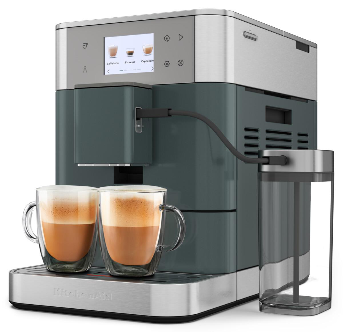 Espressomaschine mit zwei Espressogläsern. Ein Wasserbehälter befindet sich rechts.