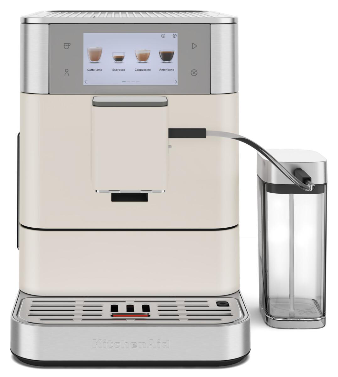 Cremefarbene Kaffeemaschine mit Touchscreen und Milchbehälter an der Seite.