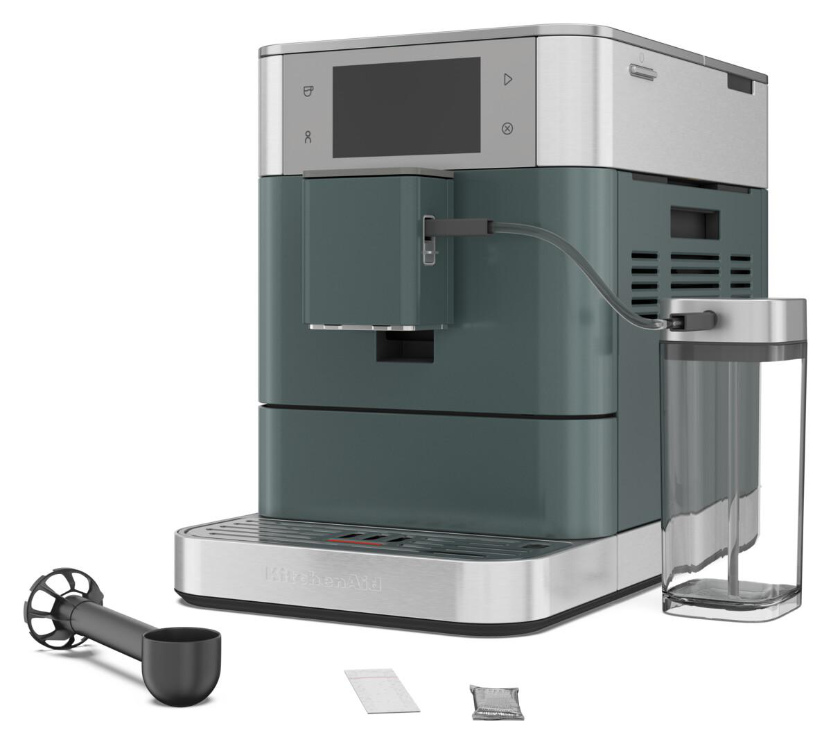 Kaffeemaschine mit Zubehör. Die Maschine ist grün und silber.