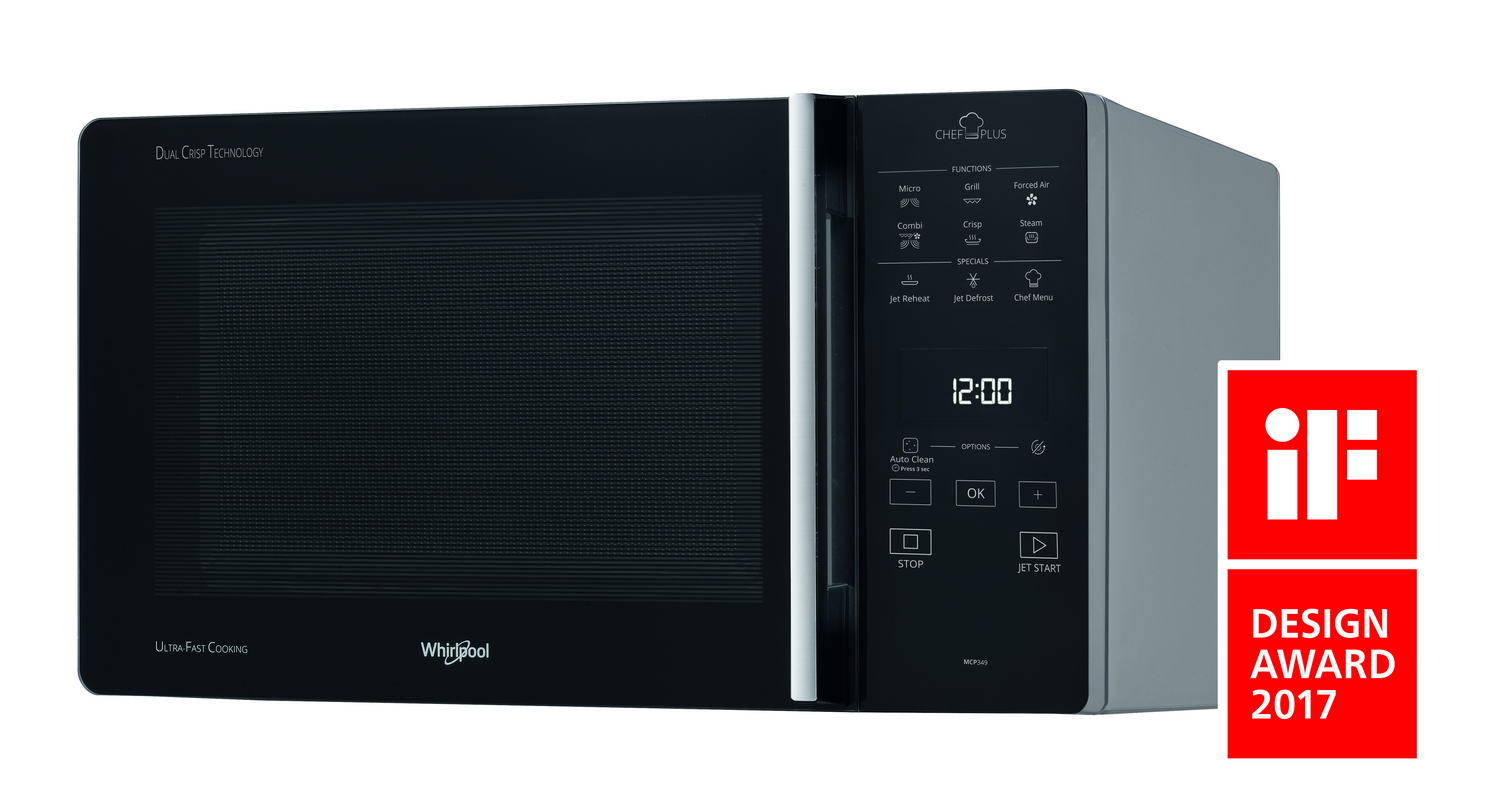 Horno microondas negro y gris con pantalla digital y logo de premio de diseño.