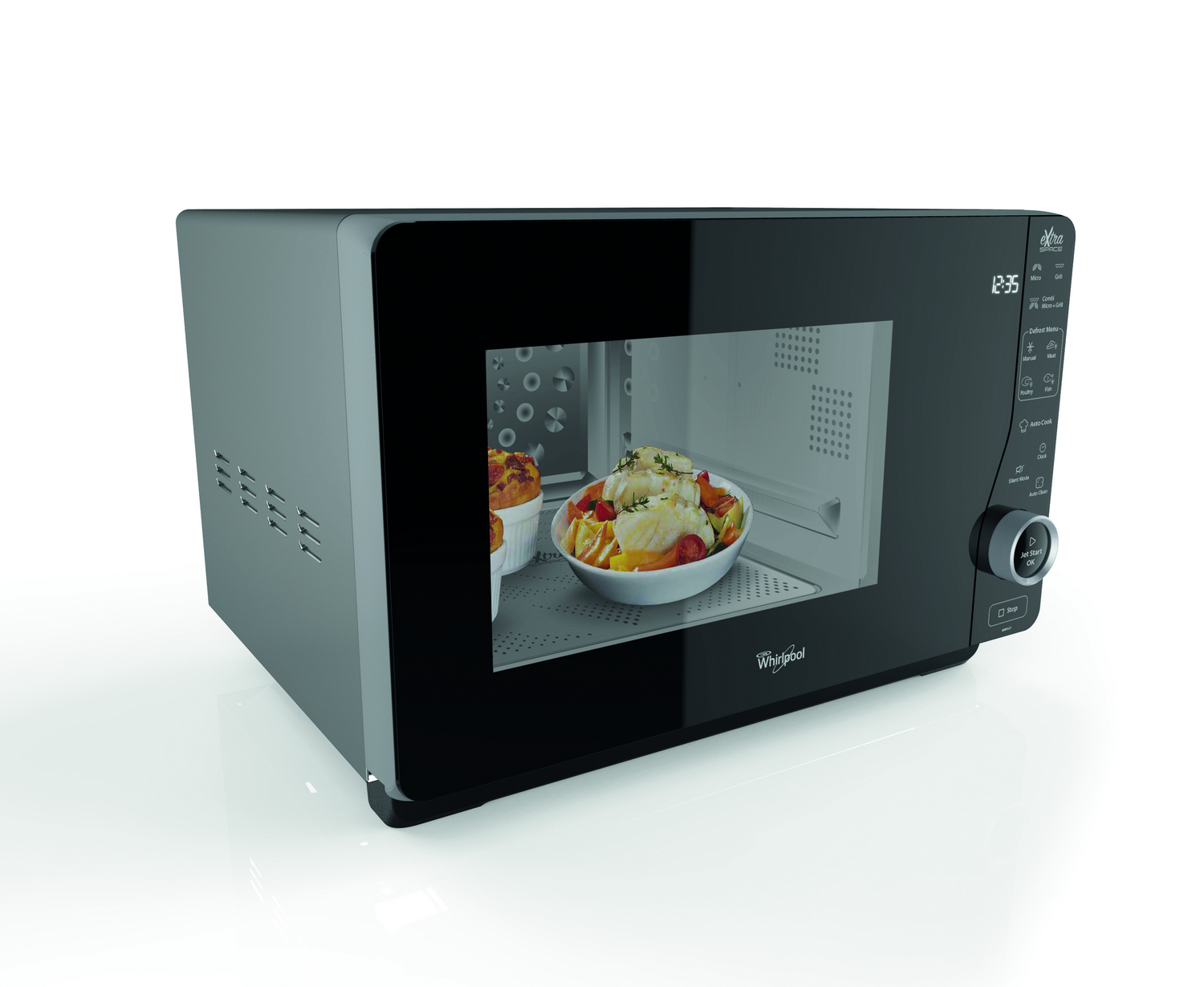 Microondas con comida dentro, pantalla digital a la derecha.