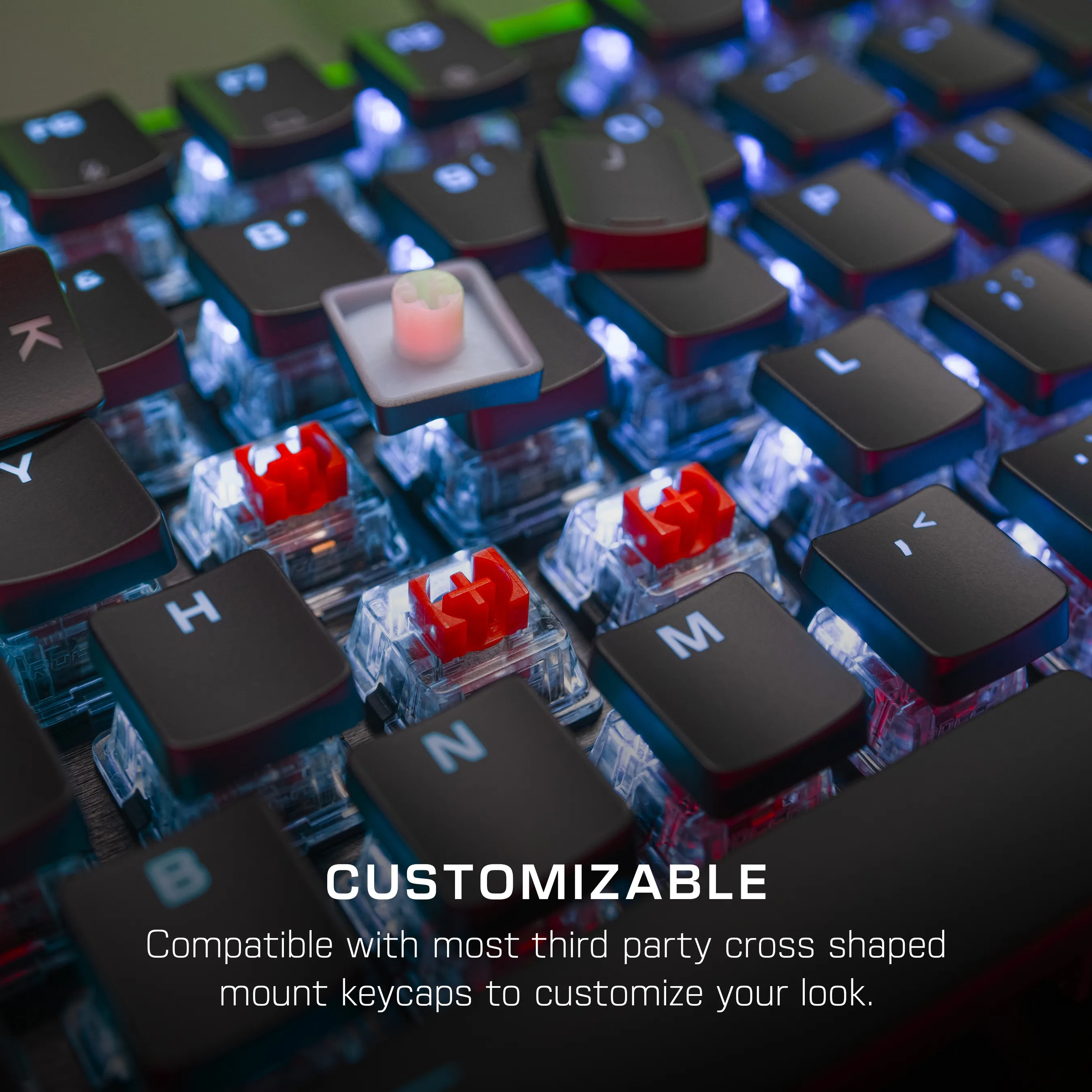 Nahaufnahme einer anpassbaren Tastatur mit schwarzen Tasten und roten Schaltern. Text: 'Customizable'.