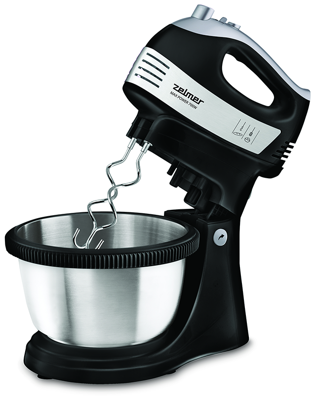 Egy fekete-ezüst kézi mixer egy tálban. A mixer a tálhoz van rögzítve.