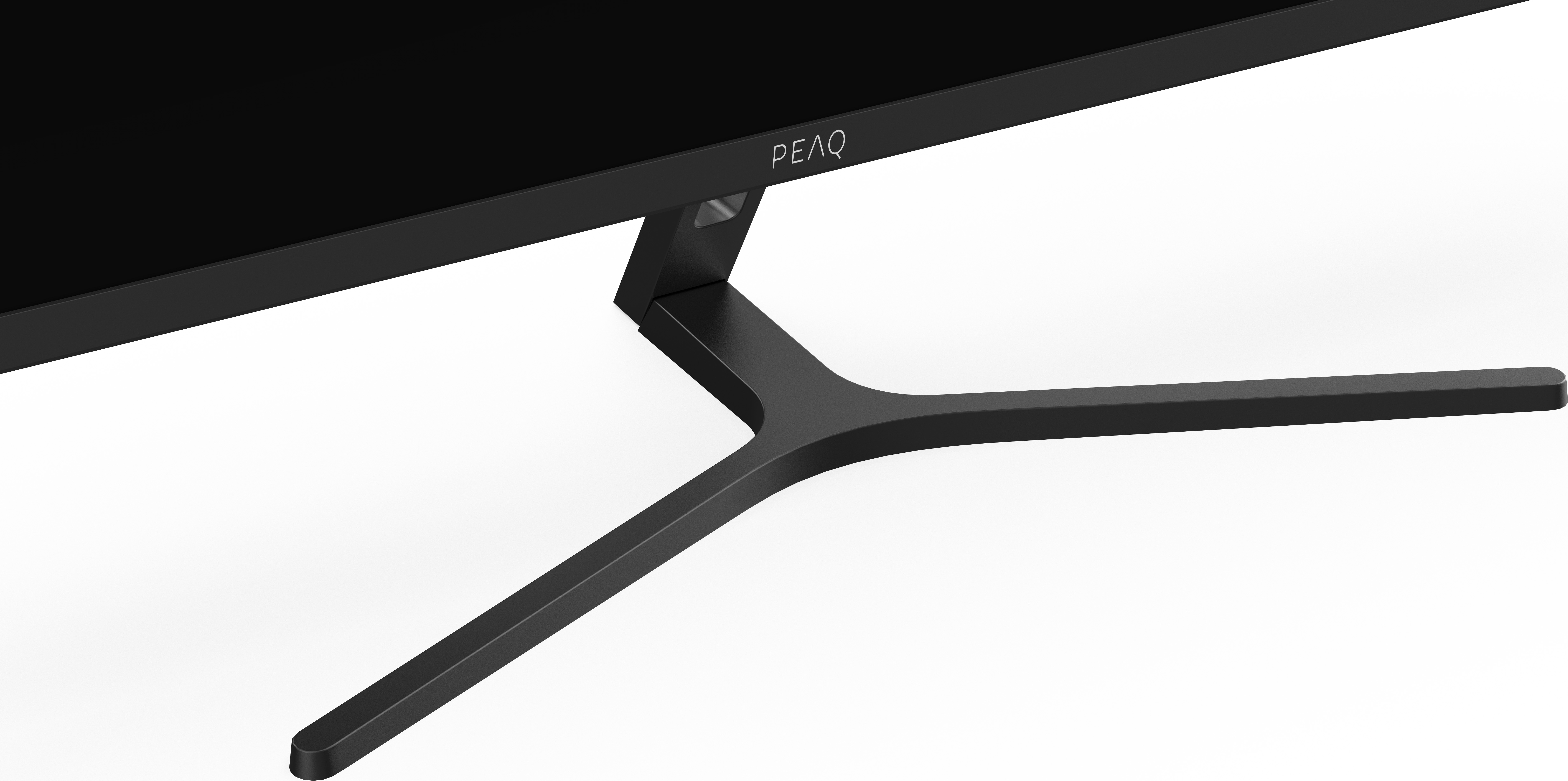 Socle de moniteur. Il a un design noir et incurvé avec un logo PEAQ.