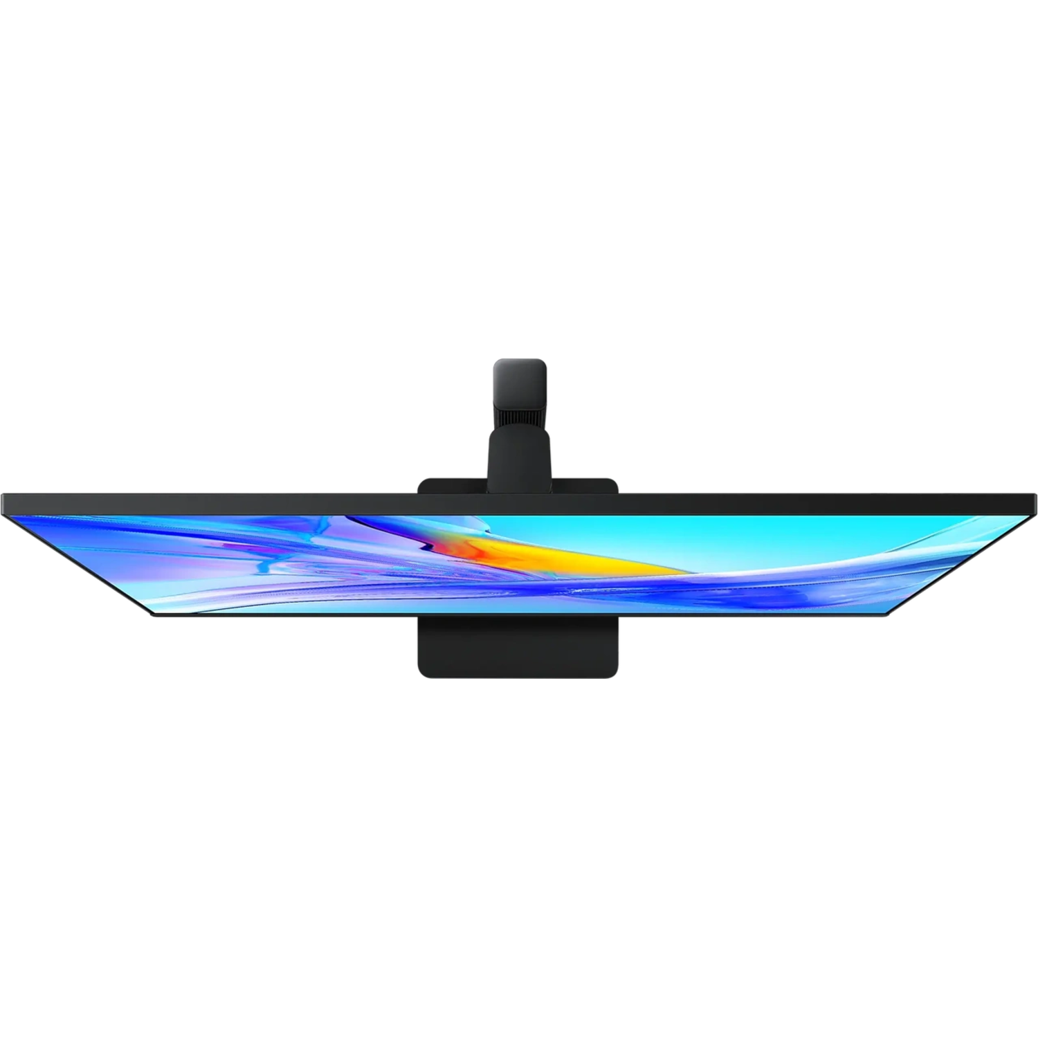 Overhead view of a black computer monitor displaying a colorful abstract image.