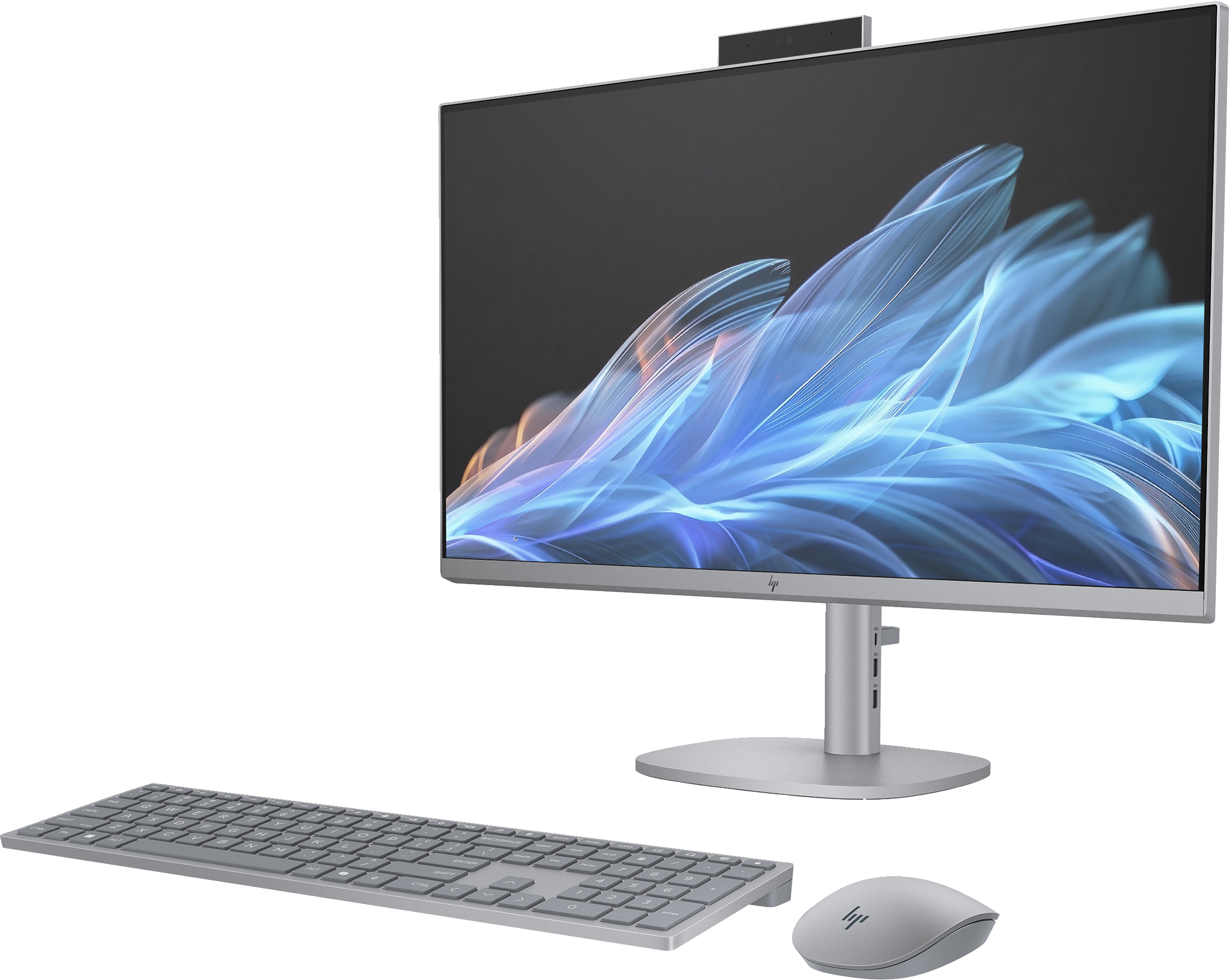 Configuration informatique moderne : Moniteur, clavier et souris. Couleur argent, fond noir.