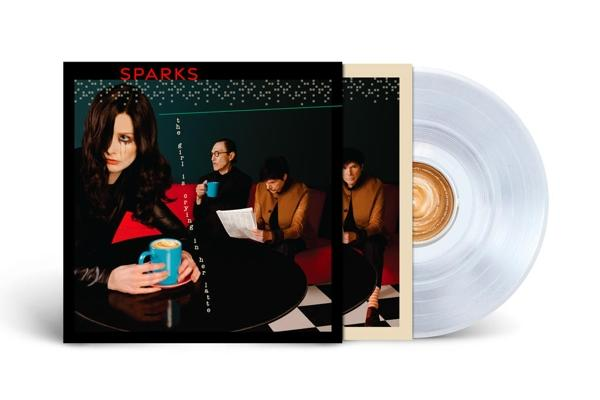 Album borító a Sparks zenekarral és egy bakelit lemezzel. Nő kávéscsészét tart. A háttérben a zenekar többi tagja.