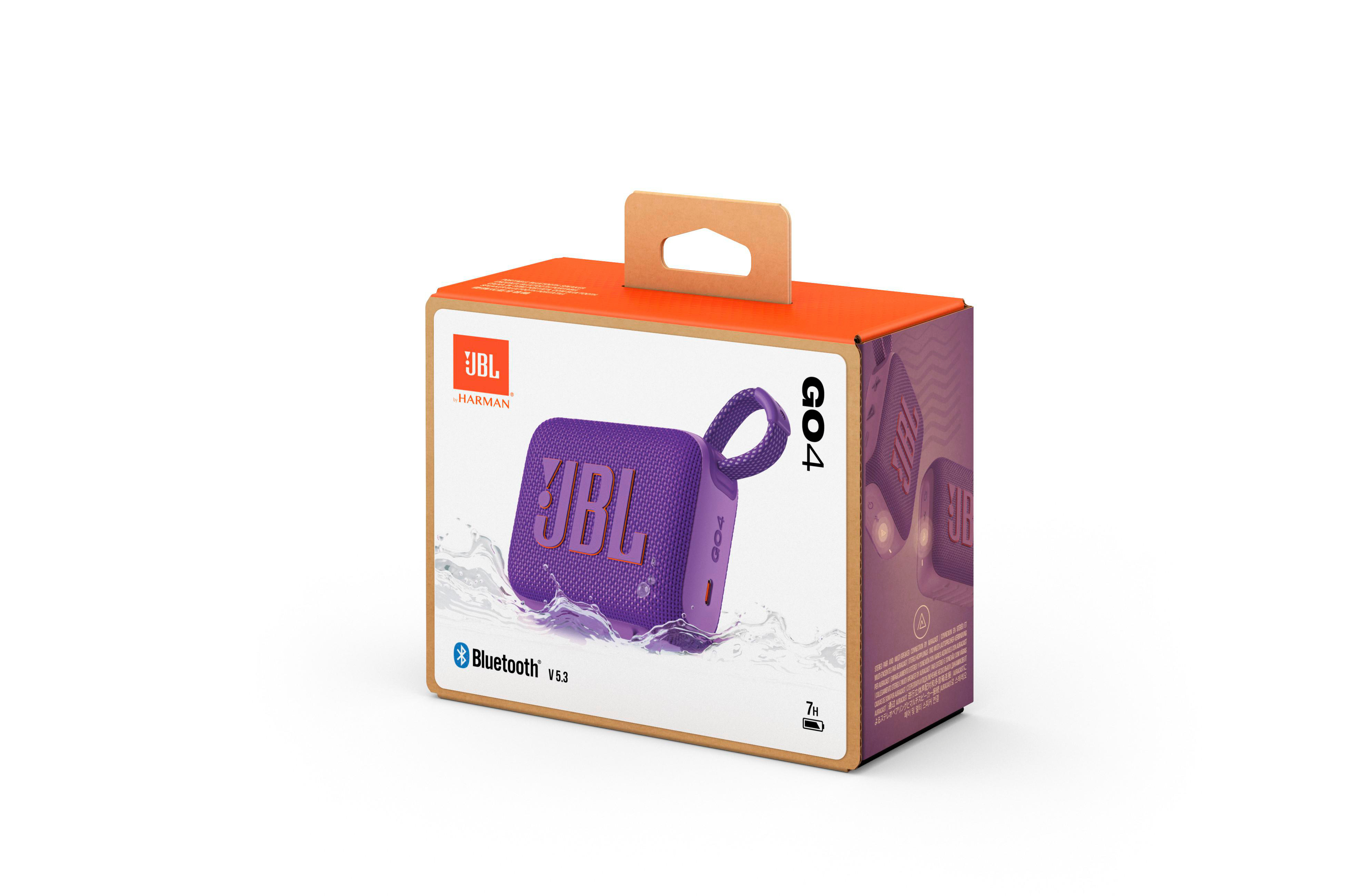 Verpackter JBL GO4-Lautsprecher. Die Box ist orange und braun, der Lautsprecher lila.