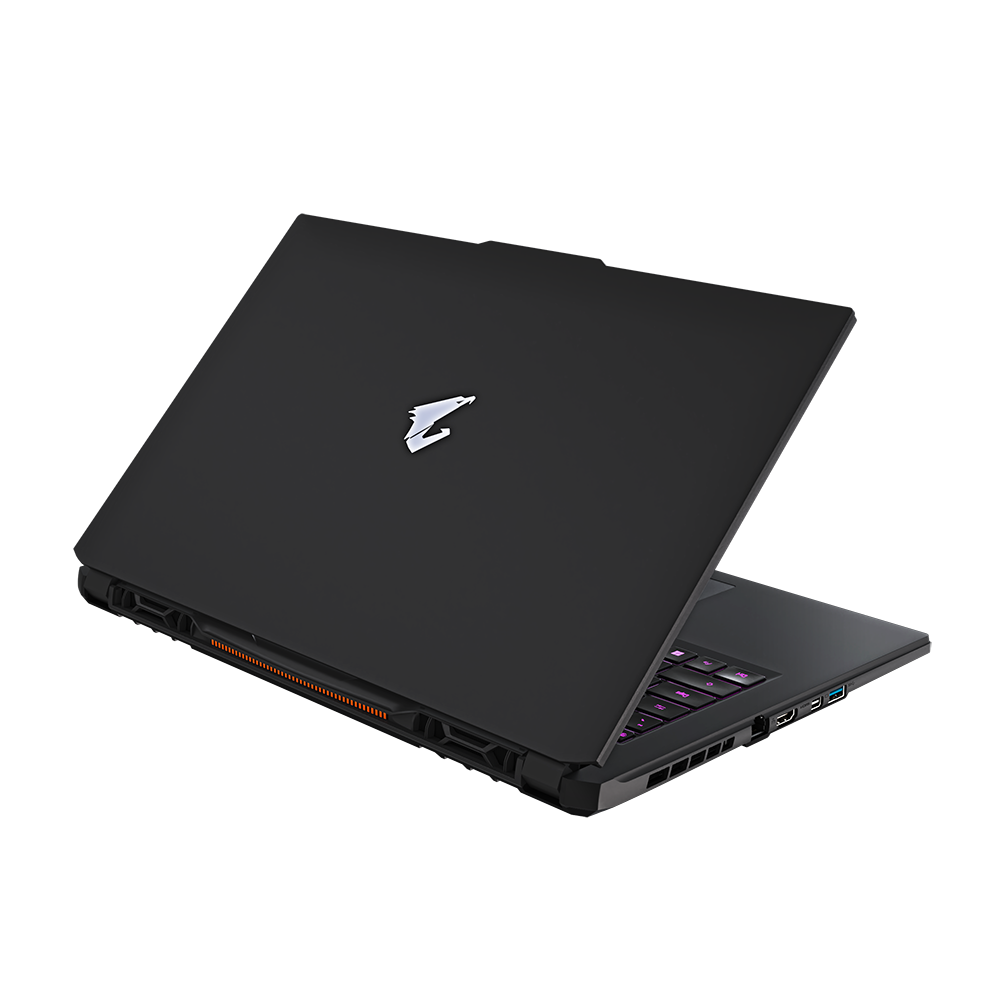 Un portátil negro con un logo iluminado en la tapa. Se ven el teclado y los puertos.
