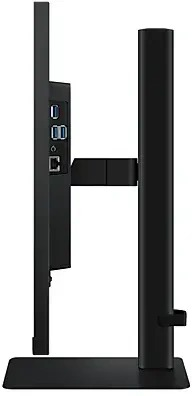 Zijaanzicht van een zwarte computermonitor met poorten en een standaard. De monitor staat uit.