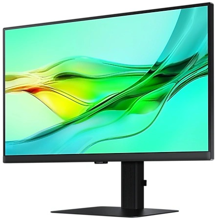 Zwarte computermonitor met groene en gele abstracte achtergrond, schuine weergave.