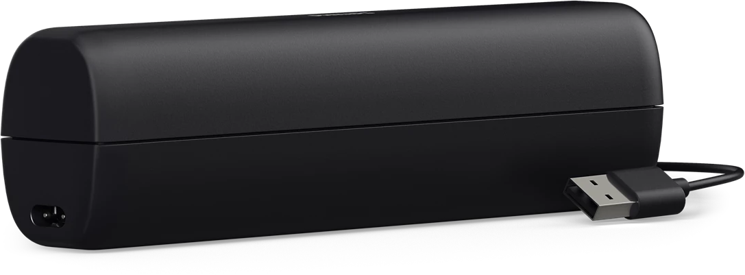 Fekete téglalap alakú töltő USB-kábellel.