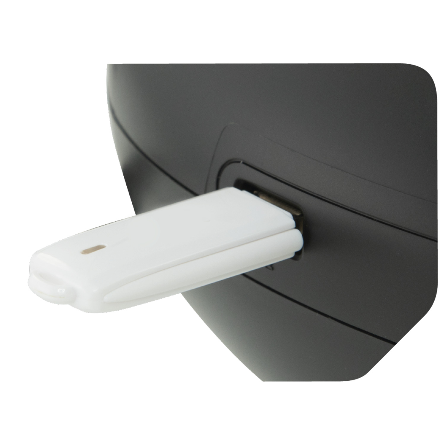 Witte USB-ontvanger aangesloten op een zwart apparaat. Het apparaat is rond met een kleine opening.