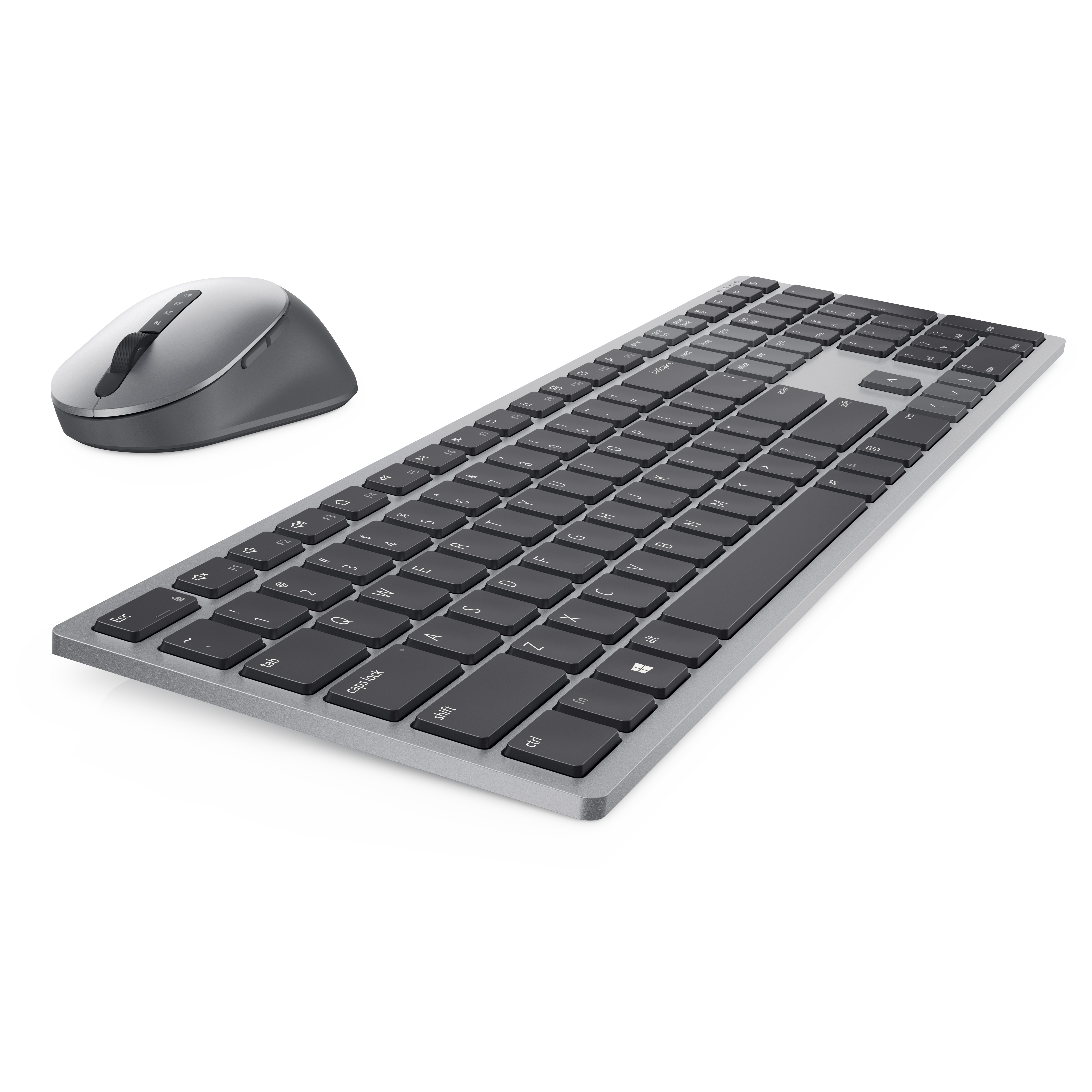 Ein silbernes Tastatur- und Maus-Set auf weißem Untergrund. Die Tastatur hat schwarze Tasten. Die Maus ist links.