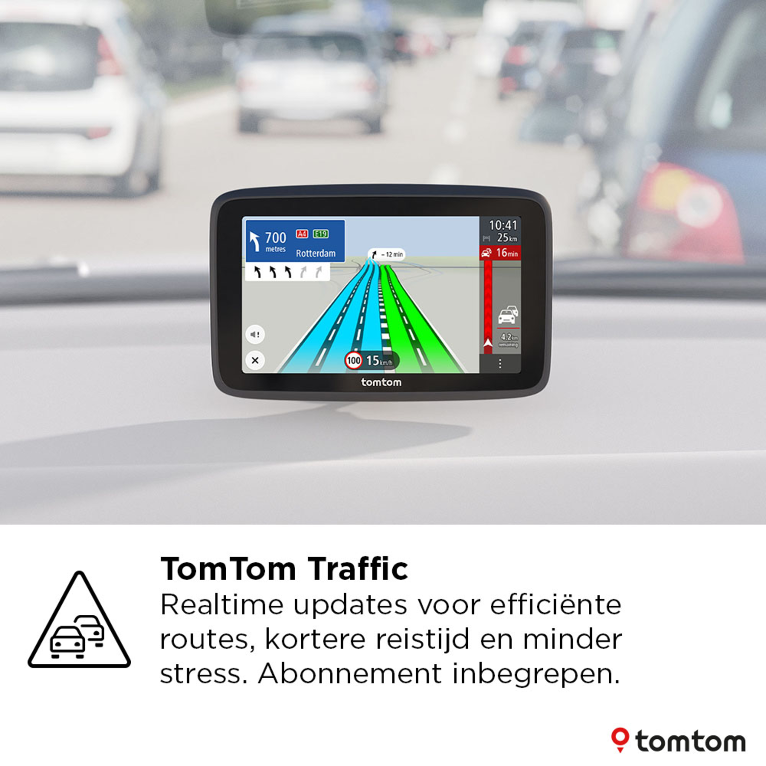 TomTom GPS on dashboard, showing directions. Cars blur in background.