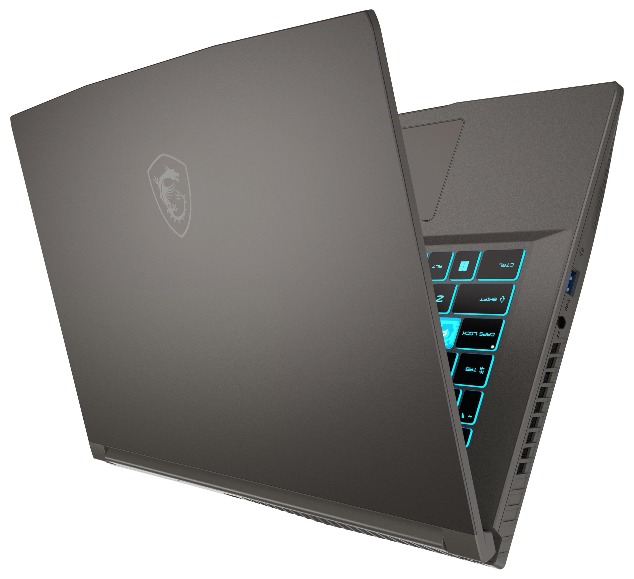 Ein dunkelgrauer Laptop ist geöffnet. Die Tastatur leuchtet blau. Der Bildschirm ist abgewinkelt.