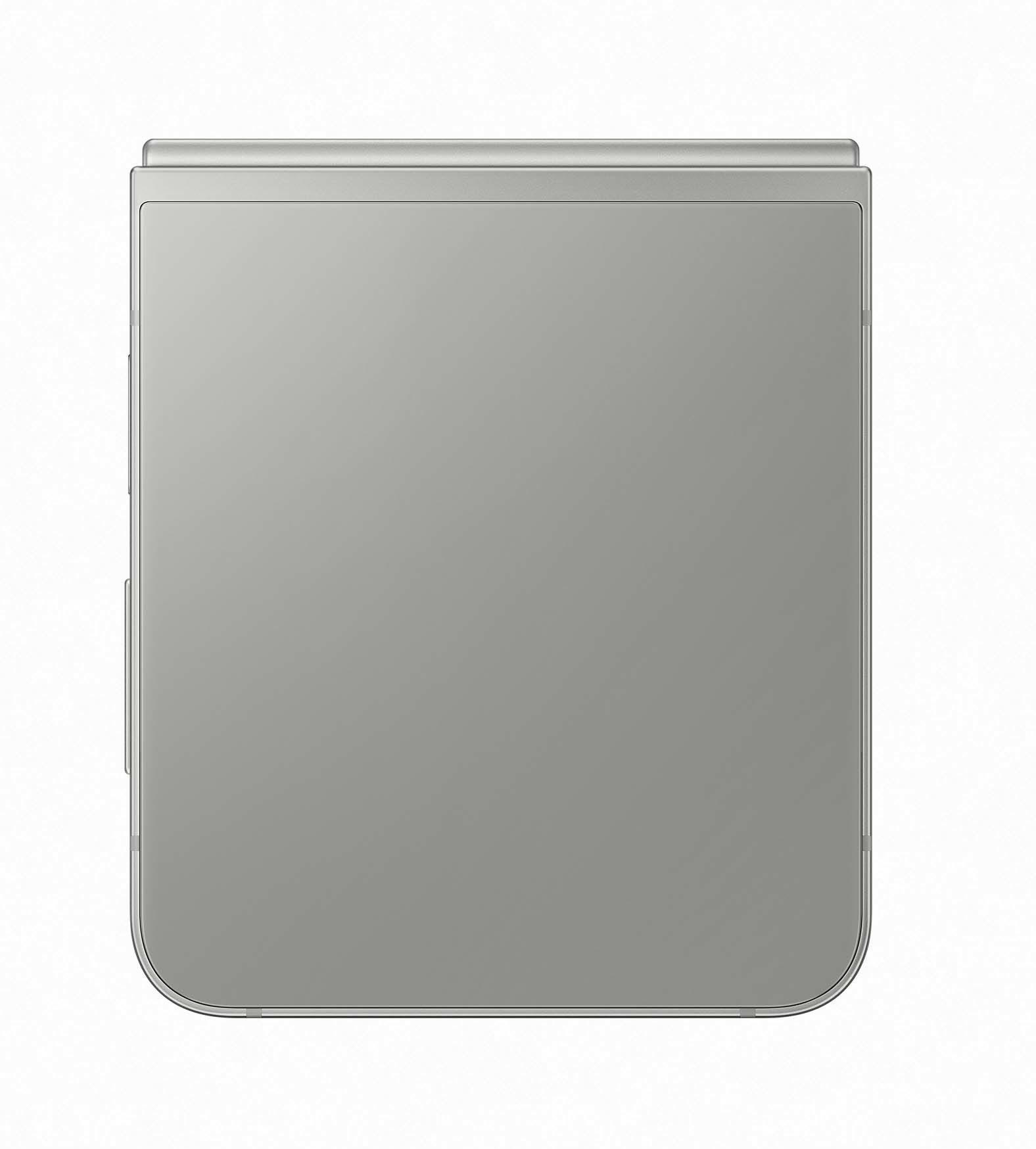 Złożony srebrny telefon. Telefon jest zamknięty, pokazując prostą, szarą powierzchnię.