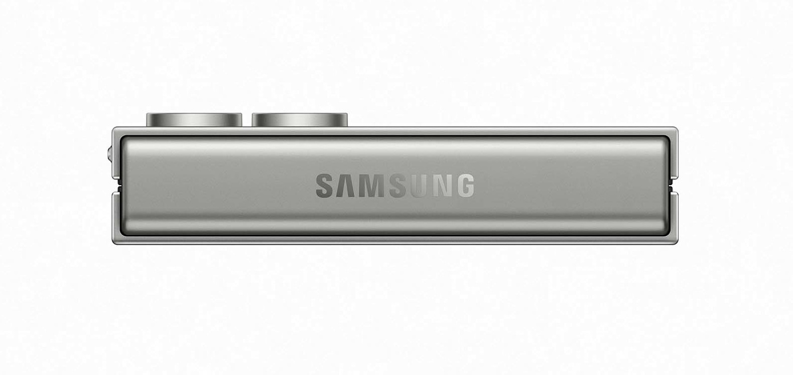 Srebrne prostokątne urządzenie z napisem "SAMSUNG". Widok z boku, prosty design.