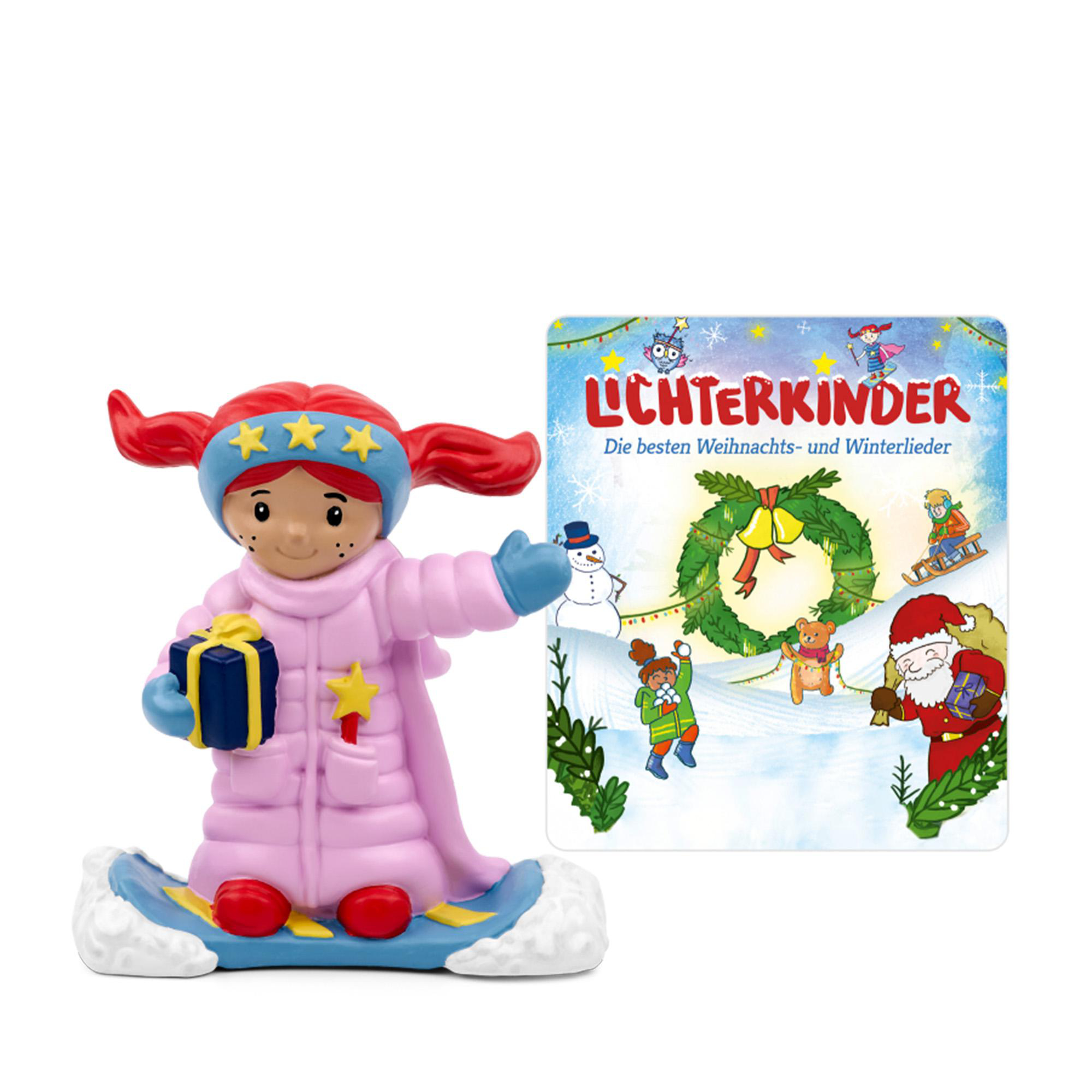 Eine Figur einer Figur auf Skiern mit einem Buch. Der Text auf dem Buch lautet LICHTERKINDER.