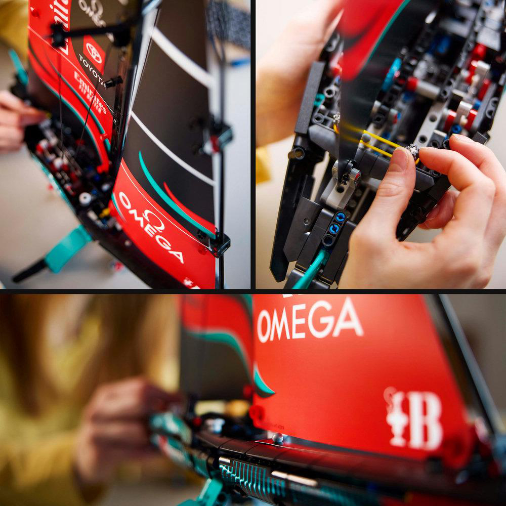 Nahaufnahme eines Lego Technic Segelbootes beim Zusammenbau, mit Händen und LEGO-Teilen.