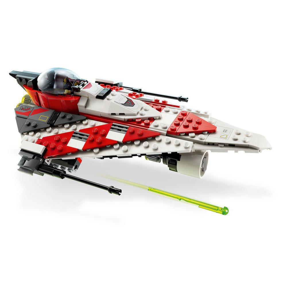 Lego Star Wars Schiff. Das Schiff ist rot und weiß. Es hat einen grünen Laserstrahl, der herauskommt.