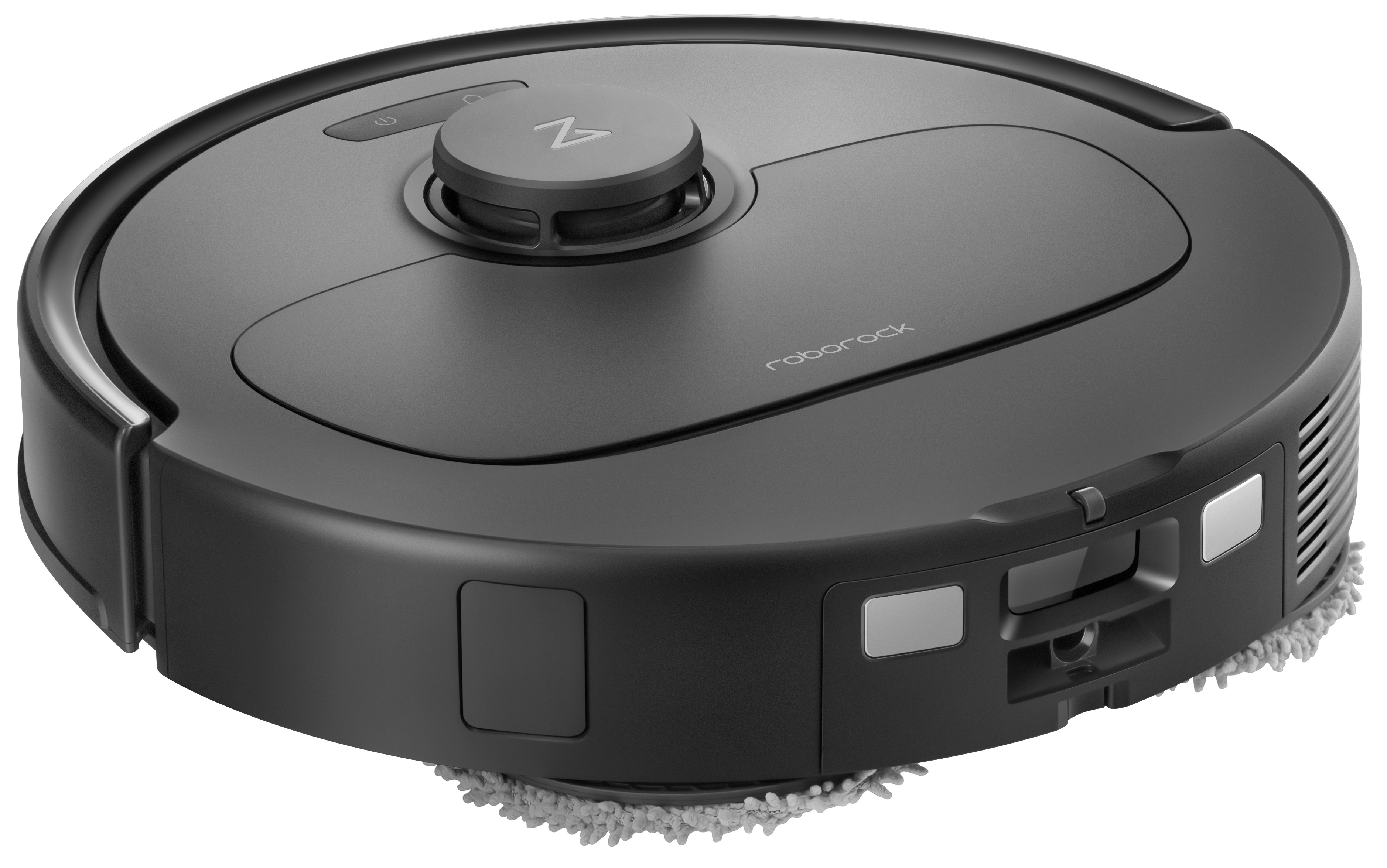 Czarny odkurzacz robot Roborock, widok z góry. Odkurzacz jest na białej powierzchni.