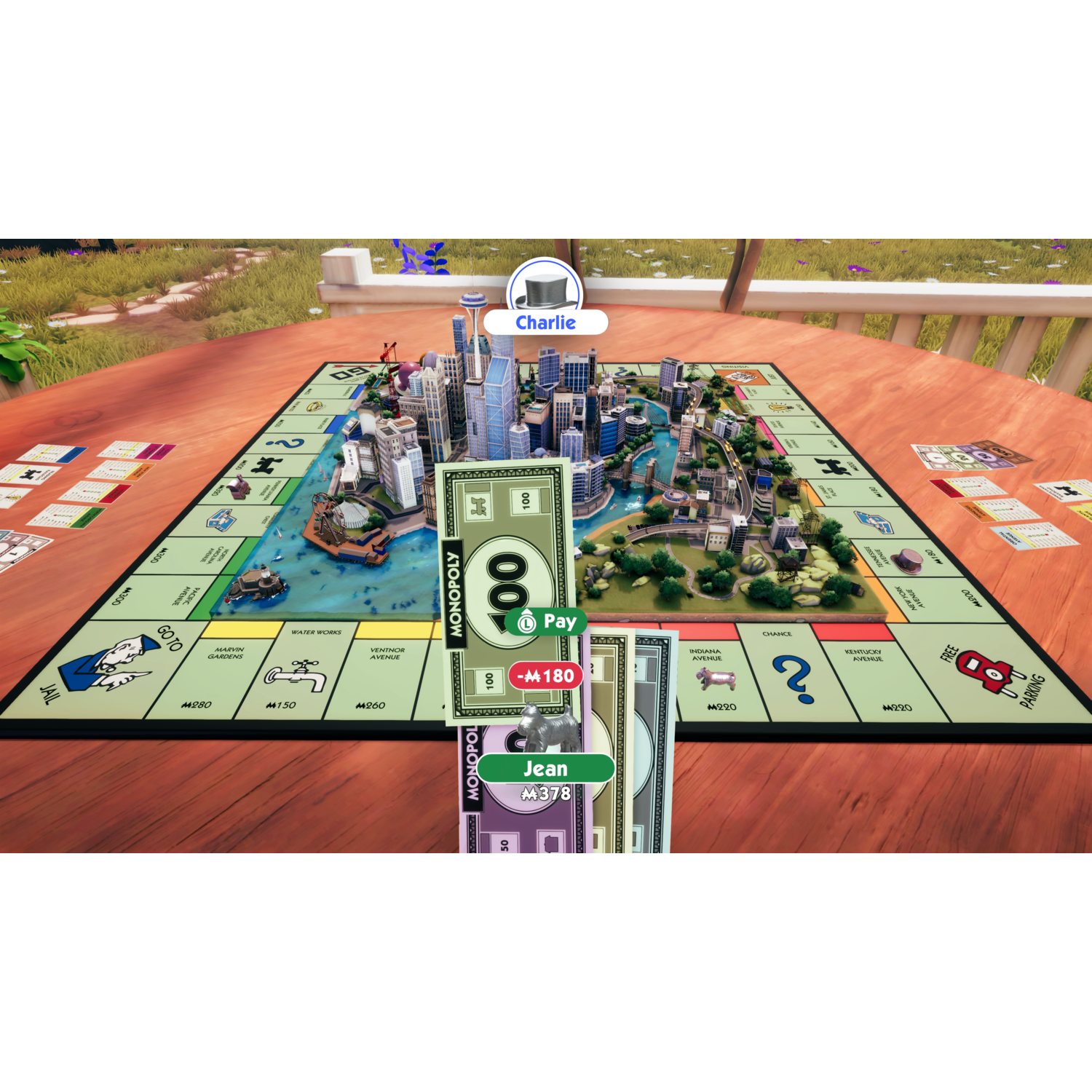 Monopoly-bord met geld en speelstukken, van bovenaf gezien.