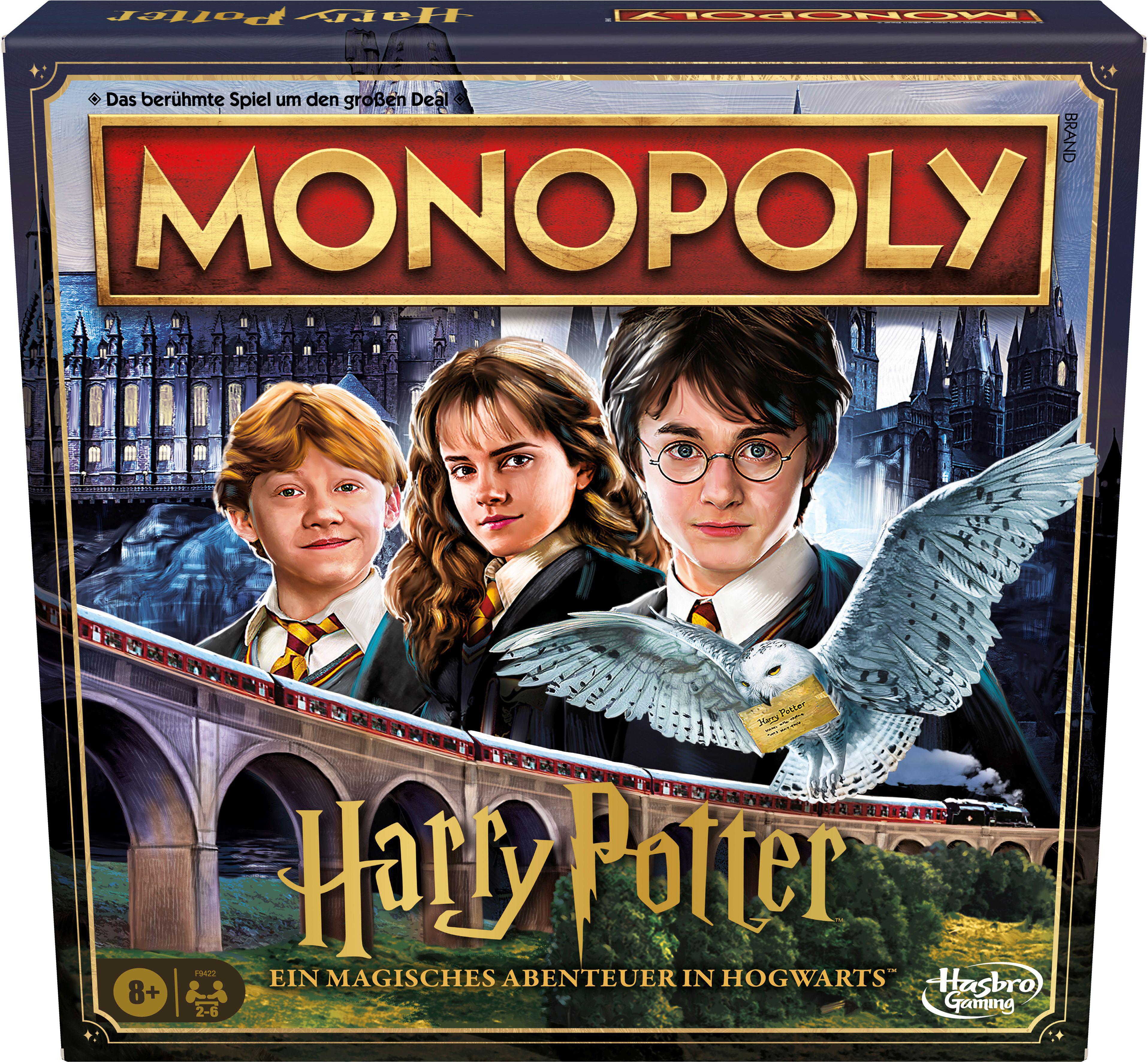 Monopoly Harry Potter Spielbox. Mit Harry, Ron, Hermine und einer Schnee-Eule. Der Hogwarts Express ist im Hintergrund.