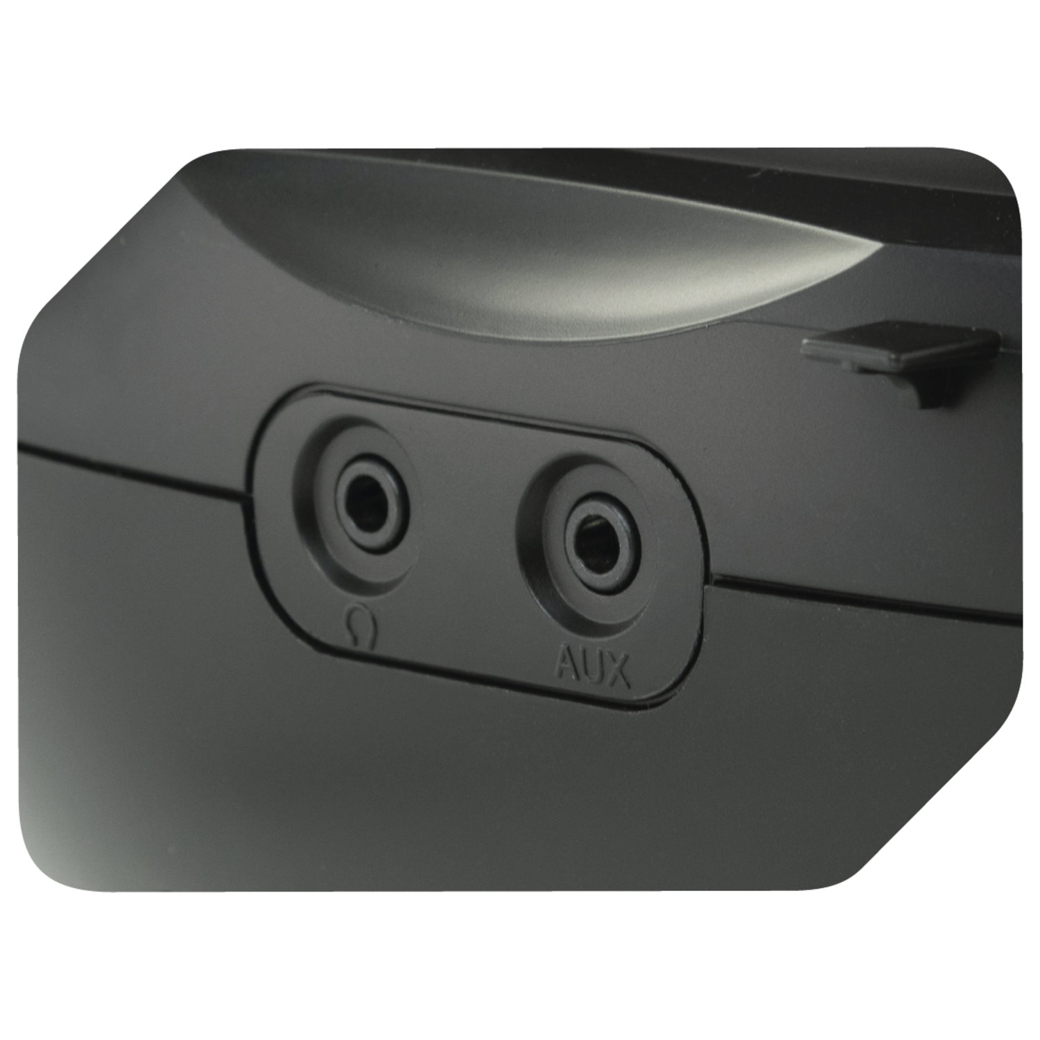 Close up of two circular audio jacks labeled 'Ω' and 'AUX'.