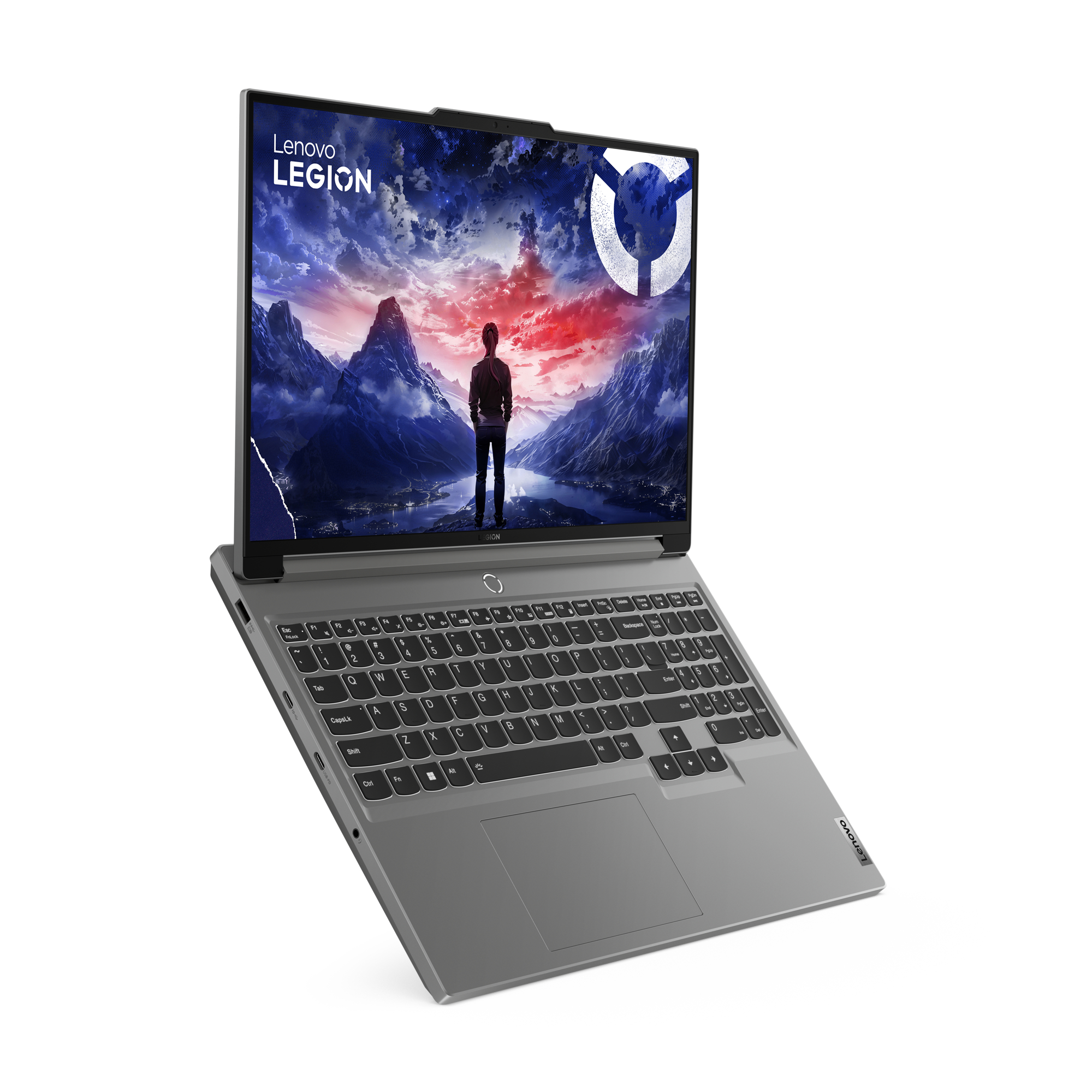 Lenovo Legion Laptop. Der Bildschirm zeigt eine Berglandschaft. Der Laptop ist grau und nach oben geneigt.