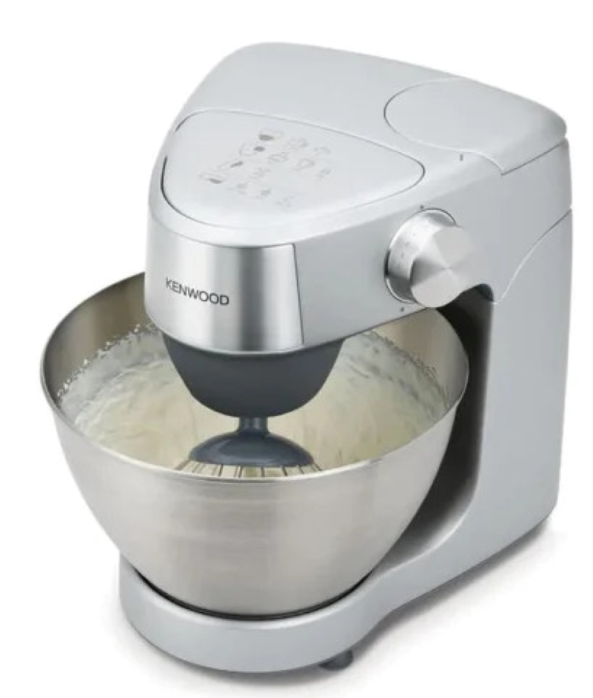 Srebrny robot kuchenny Kenwood ze stalową misą wypełnioną bitą śmietaną.