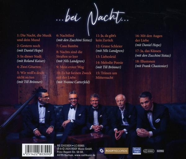 Albumcover mit einer Gruppe von Männern in Anzügen und dem Text der Songs.