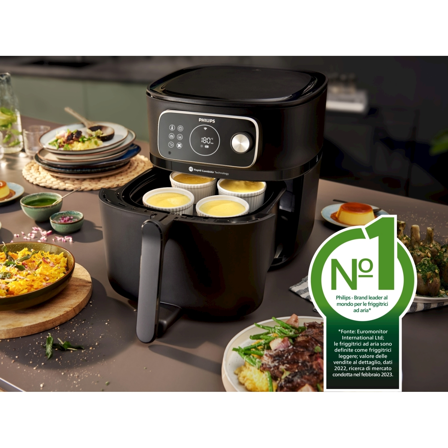 Friggitrice ad aria nera con cibo, un cartello e ingredienti.