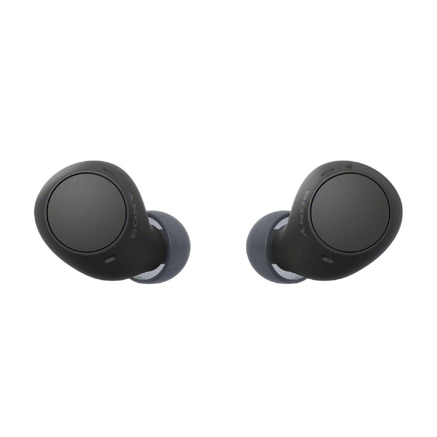 Coppia di auricolari neri, ripresa ravvicinata.