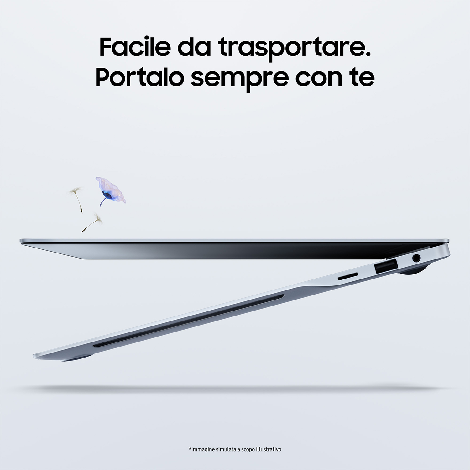 Un laptop argentato in posizione aperta con testo in italiano e un'illustrazione floreale.