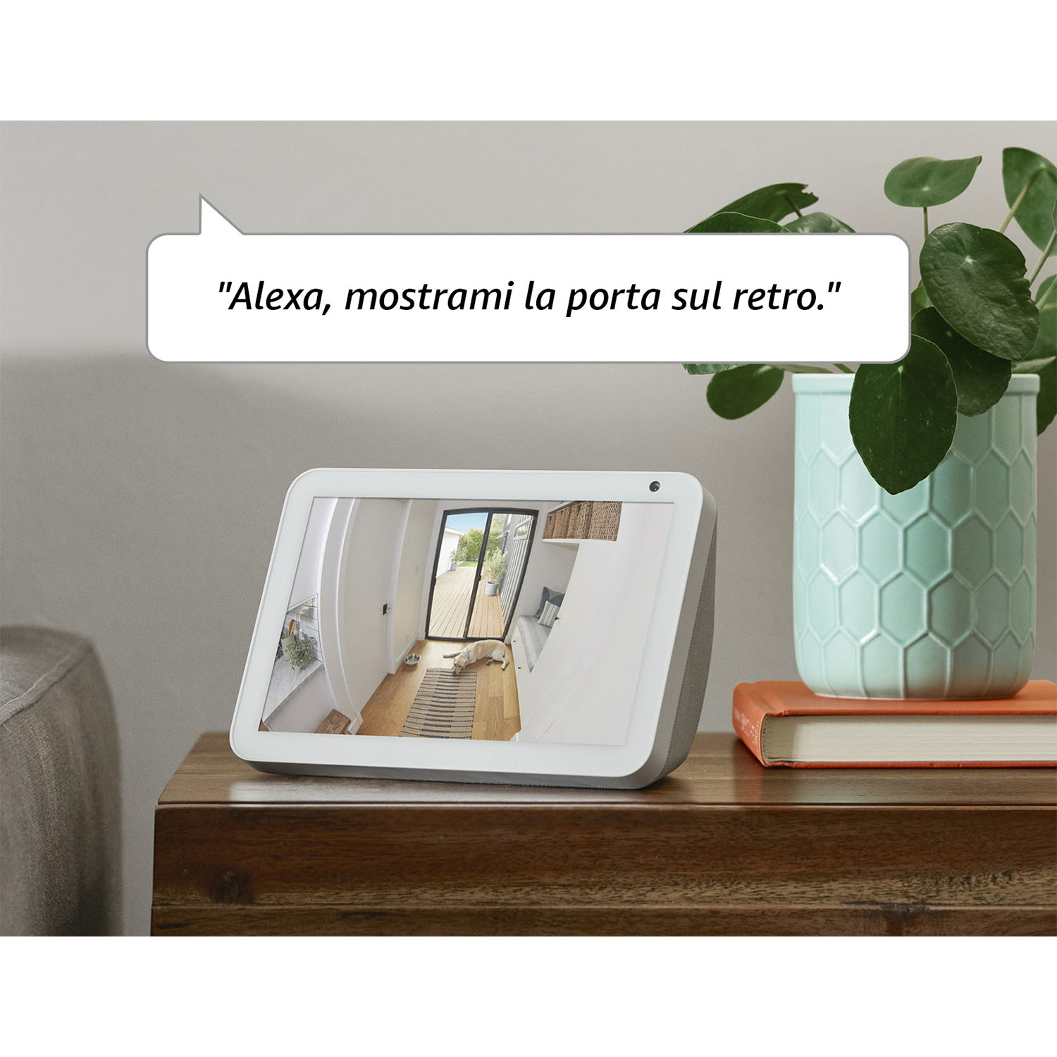 Display intelligente con schermo che mostra una stanza, fumetto con testo.