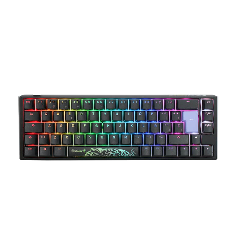 Teclado negro con luces LED de colores. El teclado tiene un diseño de tigre en la barra espaciadora.