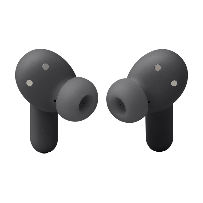 Dos auriculares tipo botón grises sobre fondo blanco. Los auriculares están ligeramente angulados.