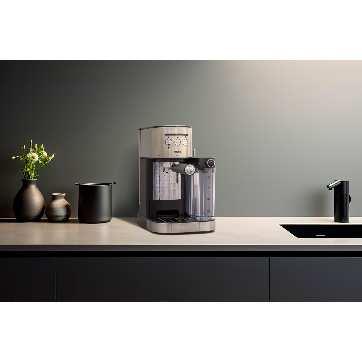 A silver and black espresso machine with a water tank and control buttons.