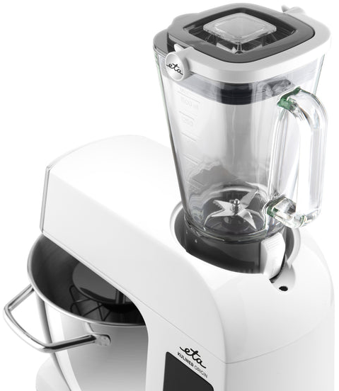 Egy fehér konyhai robotgép átlátszó turmix tartozékkal.
