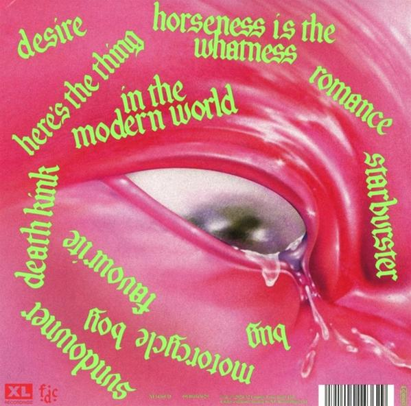 Rosa Albumcover mit grünem Text, verschiedene Phrasen wie 'romance' und 'starburst'.