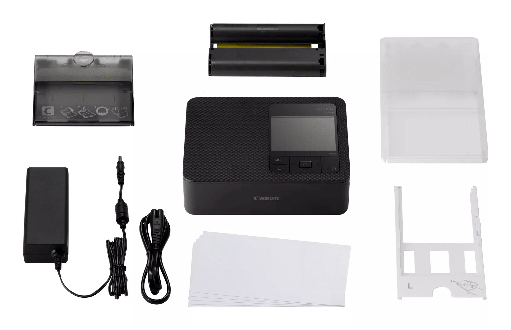 Eine Sammlung von Canon-Fotodrucker-Komponenten und Zubehör, Draufsicht.