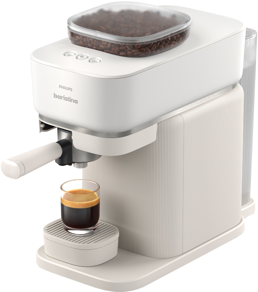 White Philips Baristina espresso machine with a glass of coffee. Coffee beans are in the top container.