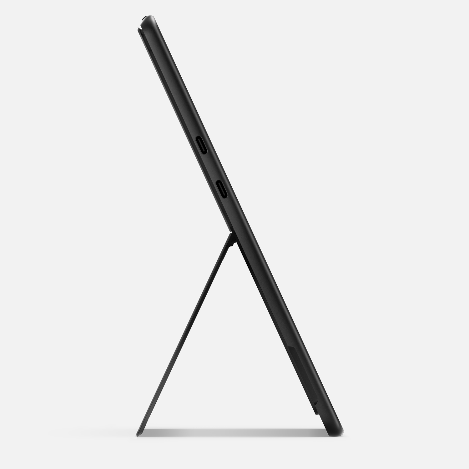 Zwarte tablet in profiel, ondersteund met een standaard.