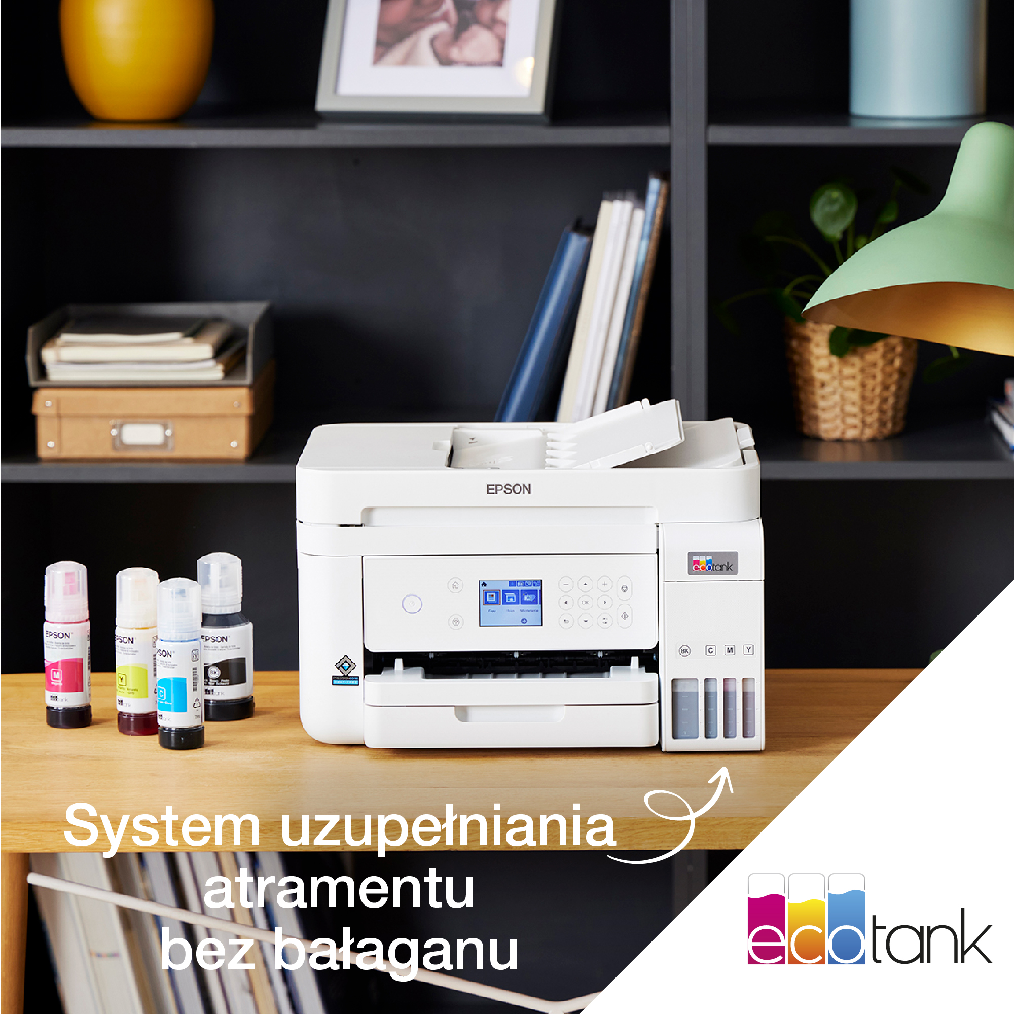 Drukarka Epson na biurku. Tekst: 'System uzupełniania tuszu'.