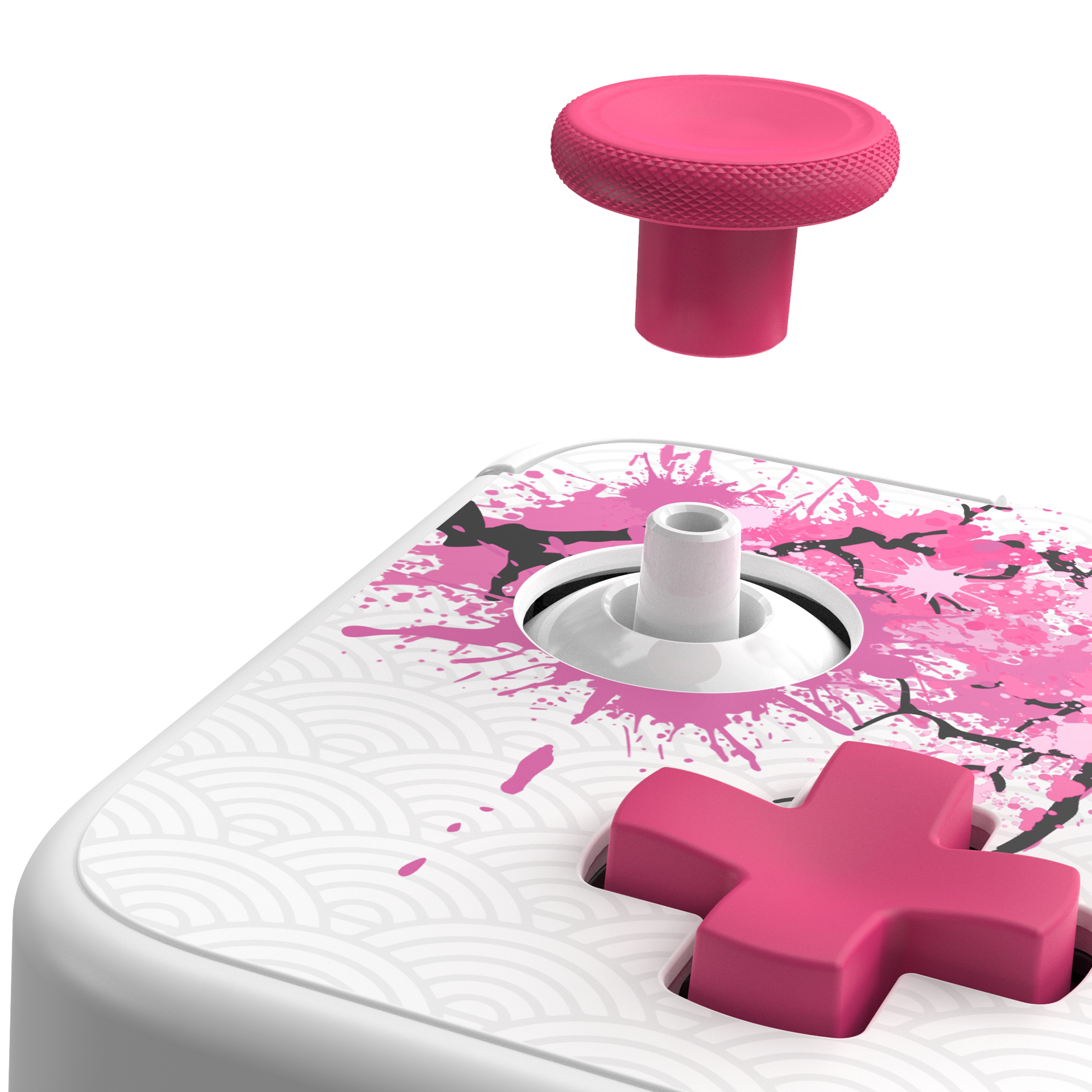Nahaufnahme eines weißen Controllers mit pinkfarbenem Joystick und pinkfarbenem Kreuzknopf.